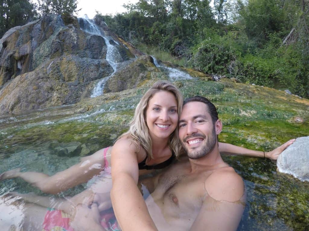 a couple bathing in a natural hot spring