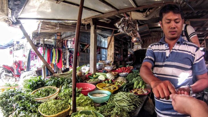 man at market in vietnam