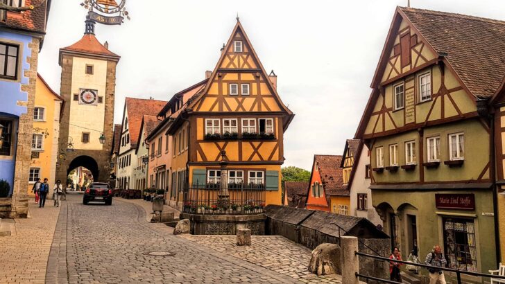 the yellow plonlein half timbered house among the cobblestone streets