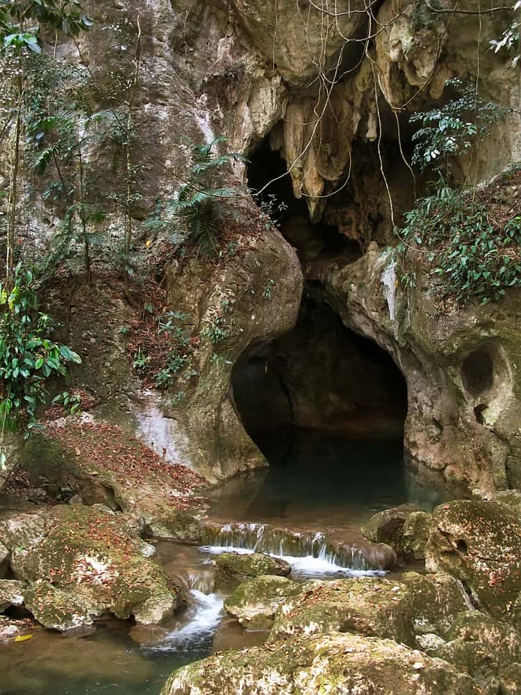 the entrance to a stone cave