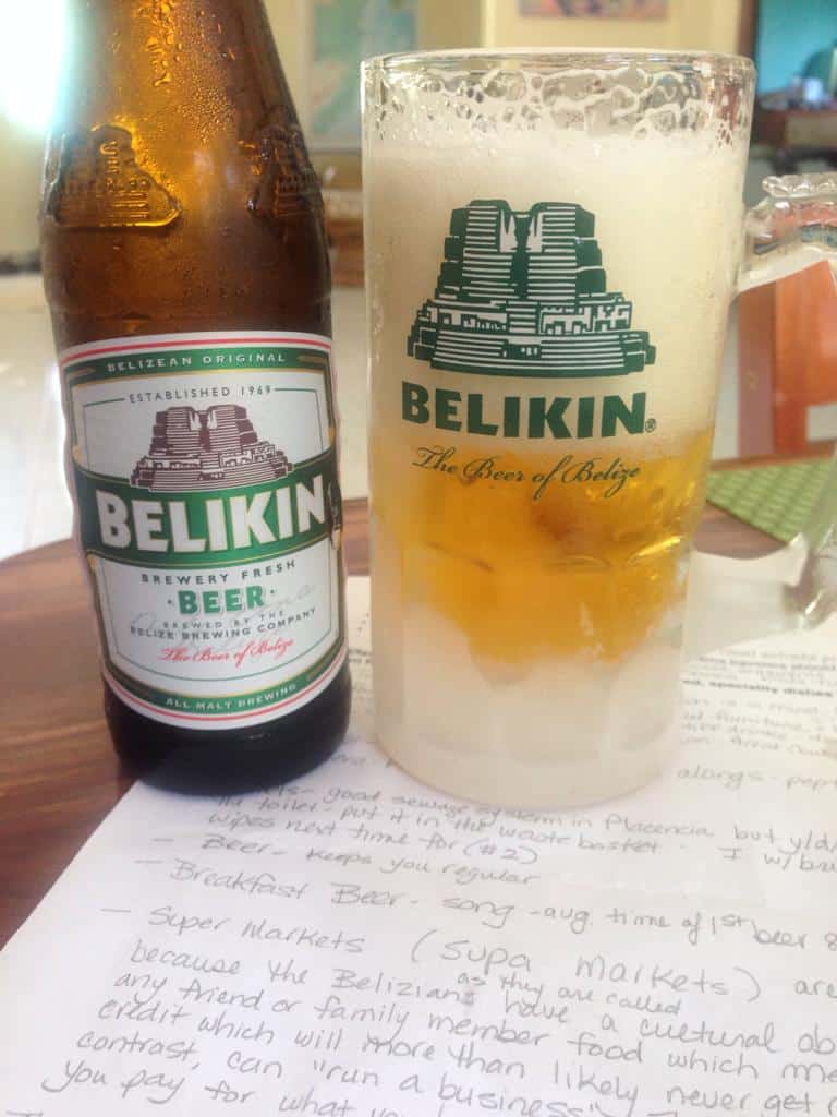 A bottle and frosted mug of local Belize beer called Belkin