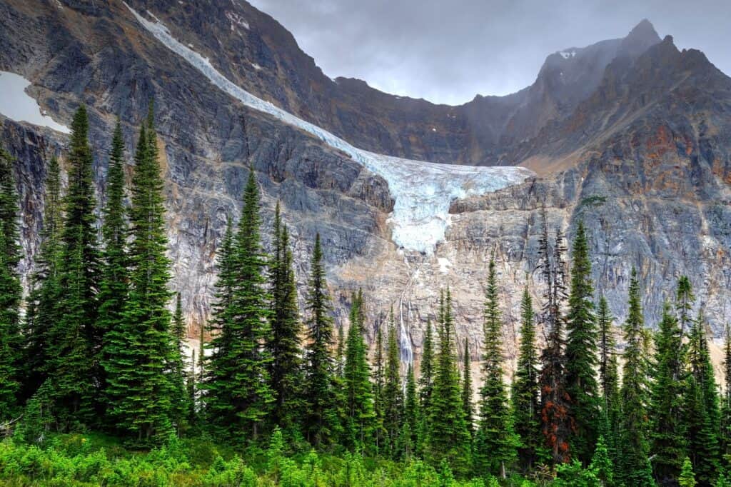 a glacier sits inside a mountain cirque
